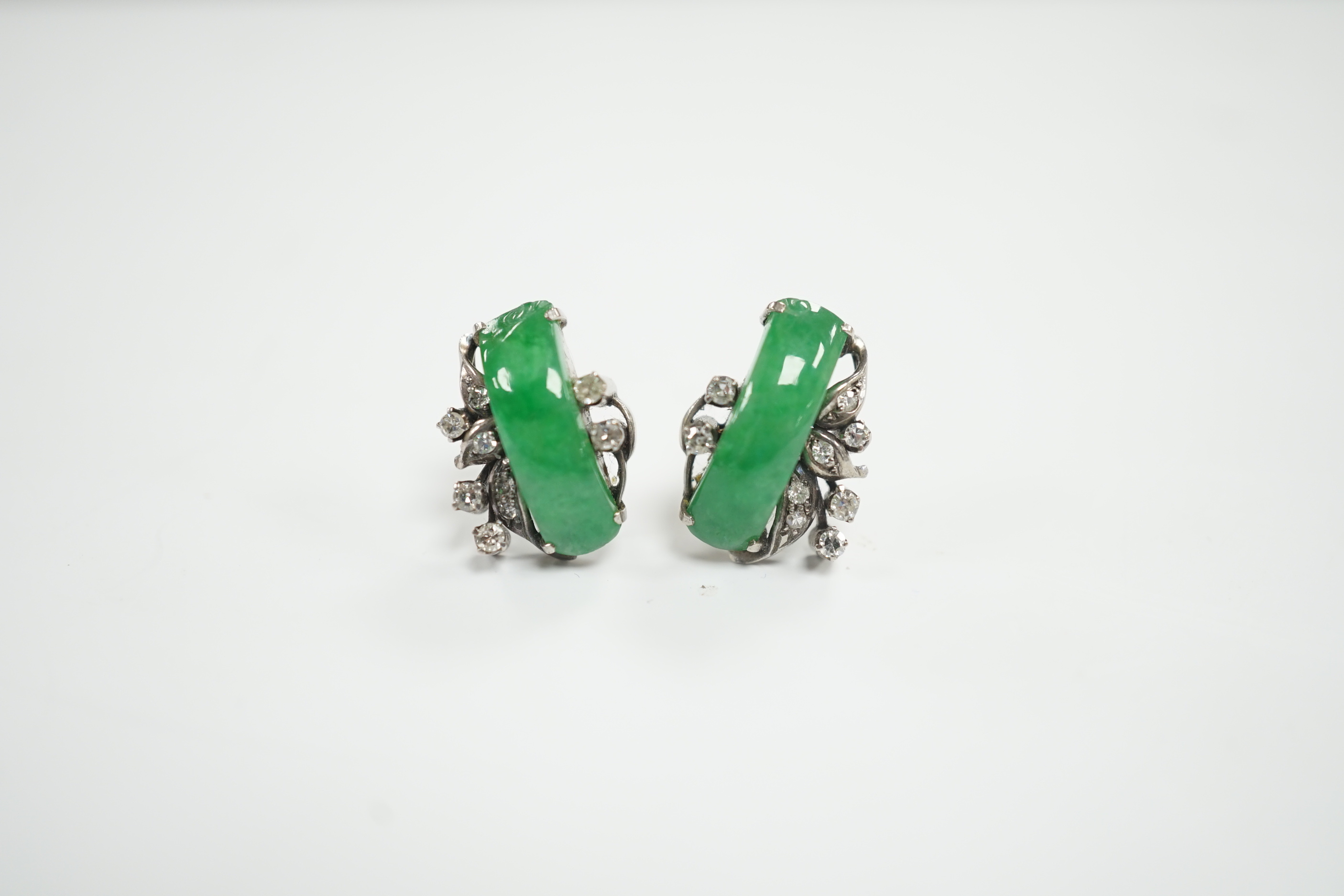 A pair of mid 20th century white metal, jade and diamond cluster set ear studs, 15mm, gross weight 4.6 grams.